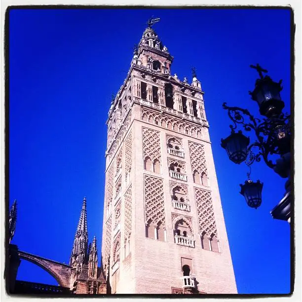 Sevilla's Cathedral "La Girlada" with a special blue deep sky