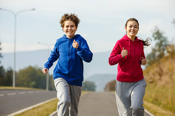 istock Young people running outdoor 465039644