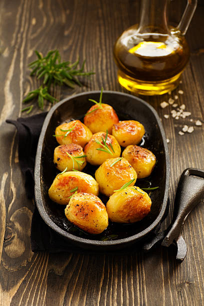 istock Baked potatoes with rosemary. 465039670