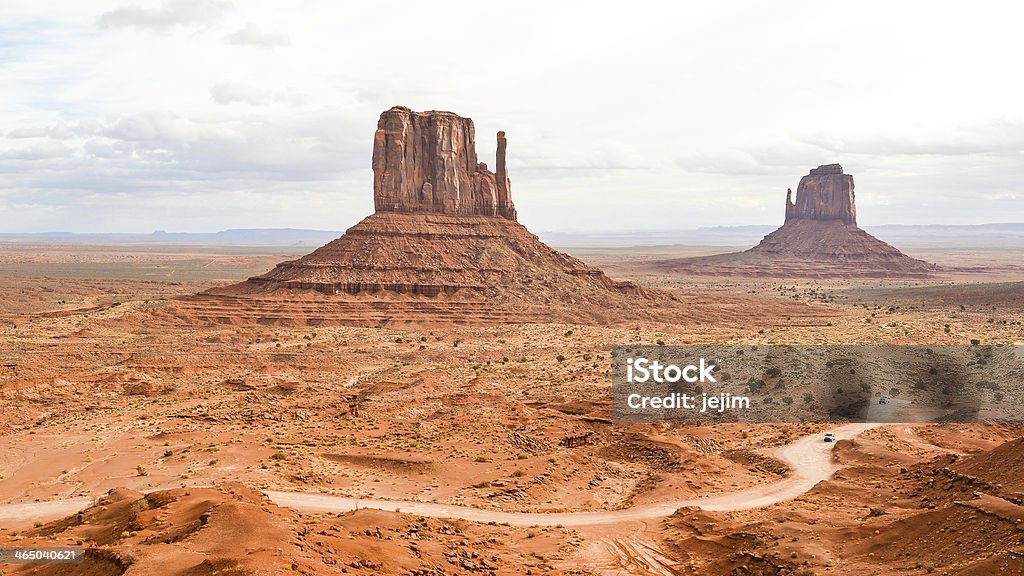 East and West Mitten Buttes, Monument Valley - Arizona East and West Mitten Buttes are two distinctive geological features found within Monument Valley in the Navajo Tribal Park, Navajo County, Arizona. Arizona Stock Photo