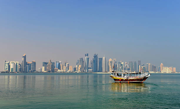 istock Dhows and Doha skyline - Doha Qatar 465041264