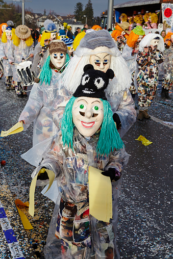 Basel, Switzerland - February 23, 2015: The Carnival at Basel (Basle - Switzerland) in the year 2015. The picture shows some costumed people on February 23, 2015.