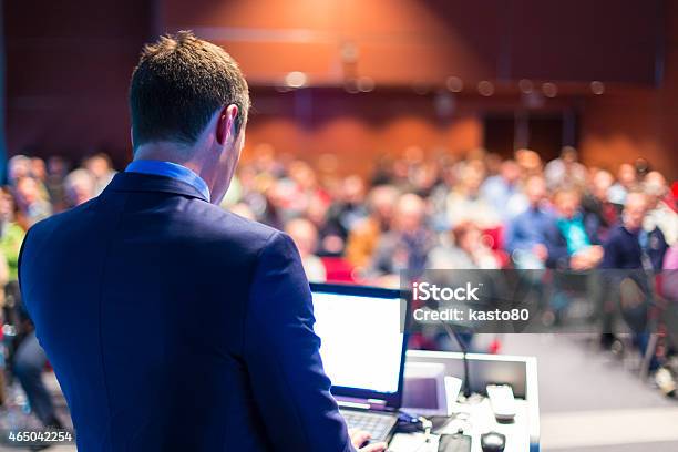 Speaker At Business Conference And Presentation Stock Photo - Download Image Now - Business Conference, Public Speaker, Speaker