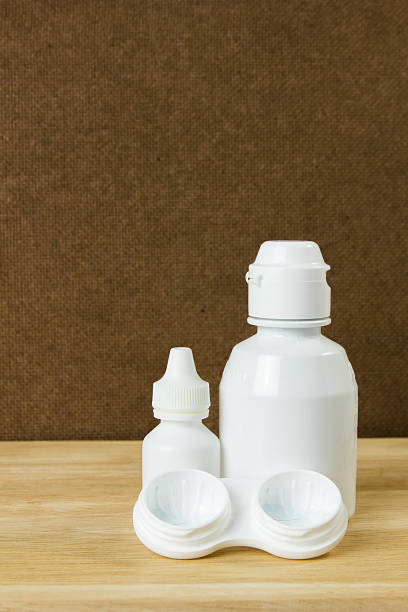 Plastic container Plastic container for eye drop and contact lens on table medicine bottle top view stock pictures, royalty-free photos & images
