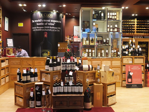 Dubai, UAE - February 22, 2014: Wine store at the Duty Free at Dubai International Airport. It is the worlds largest airport retailer based on turnover.