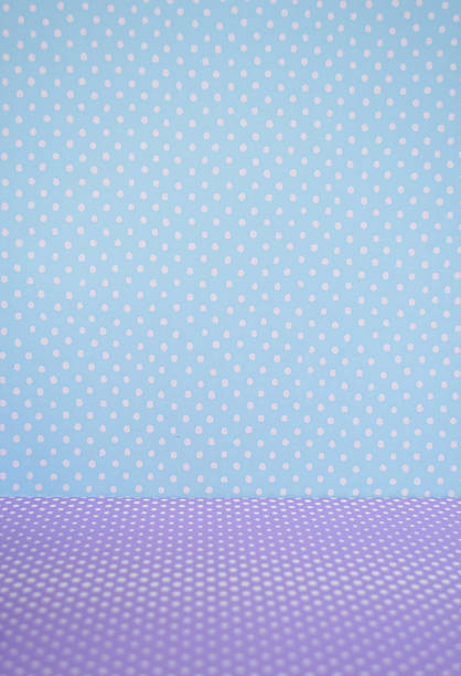 Polka dots pattern for blue wall and purple floor