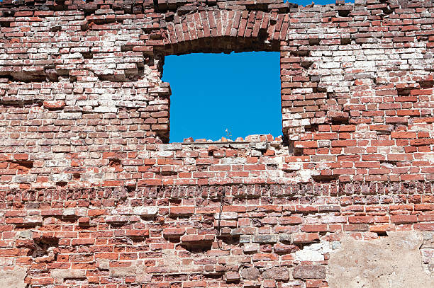 window in the ruined brick wall