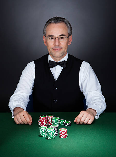 ritratto di un croupier - croupier foto e immagini stock