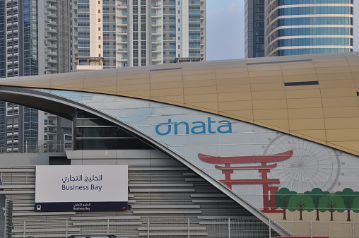 Dubai, UAE - February 19, 2014: Business Bay Metro Station in Dubai, UAE. Dubai Metro is a driverless network. Guinness World Records declared it the worlds longest fully automated metro network.