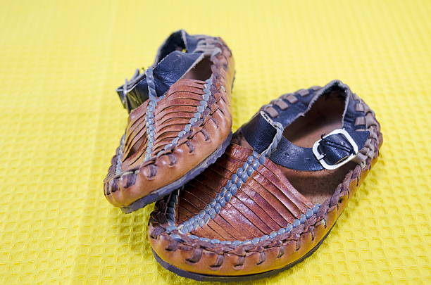 istock Traditional Serbian footwear on yellow 465045244