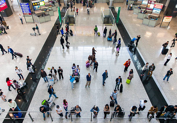People in Hong Kong International airport stock photo
