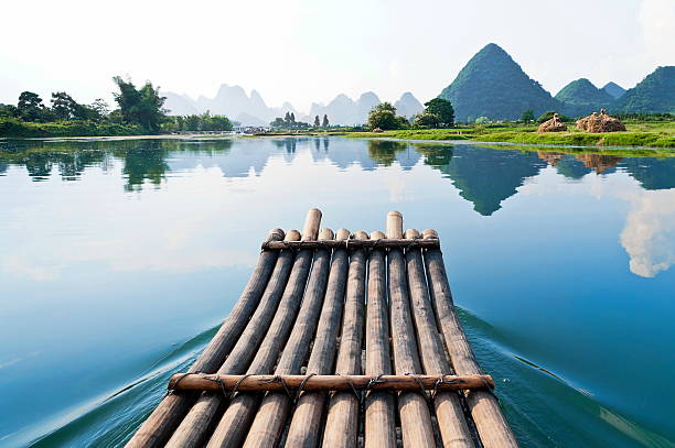 Bamboo rafting in Li River Bamboo rafting in Li River, Guilin - Yangshou China yangshuo stock pictures, royalty-free photos & images