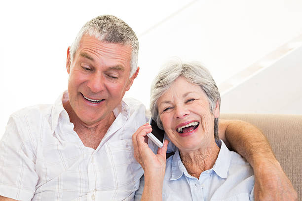 istock Senior woman answering smartphone 465046848