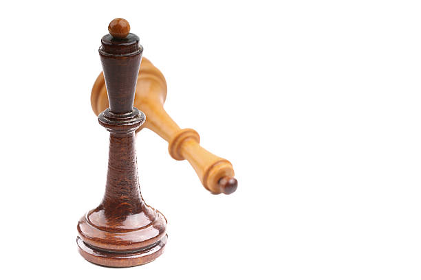 istock Two wooden chess pieces alone isolated on white 465047574