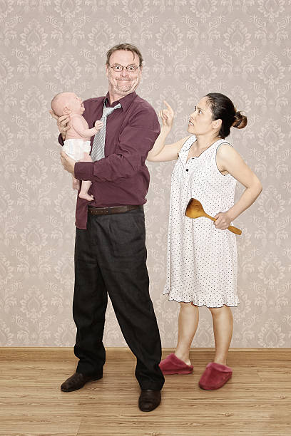 Man being Scalded by his Angry Wife Father holding his Crying Baby and being Scalded by his Angry Wife asian baby crying while mother scolding stock pictures, royalty-free photos & images