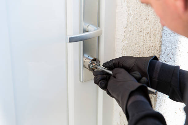 istock Burglar using special tools to break in  a house 465047820