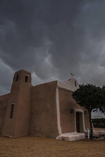 A small old adobe mission church in Golden, New Mexico
