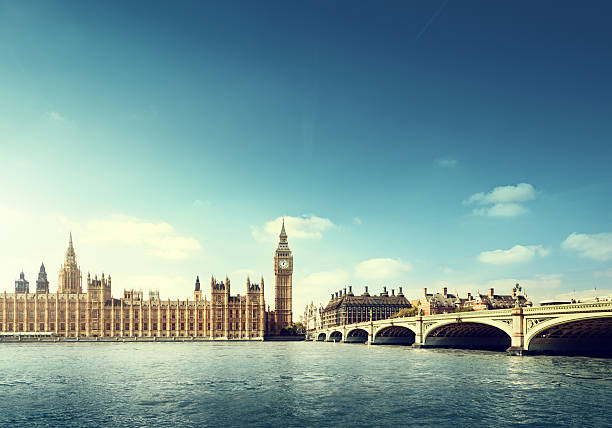 Across the water view of Big Ben in London on a sunny day Big Ben in sunny day, London city of westminster london stock pictures, royalty-free photos & images