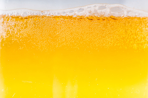 Beer bubbles in the high magnification and close-up. can be used as back ground