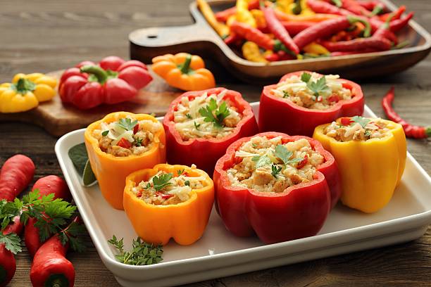 Stuffed yellow and red peppers