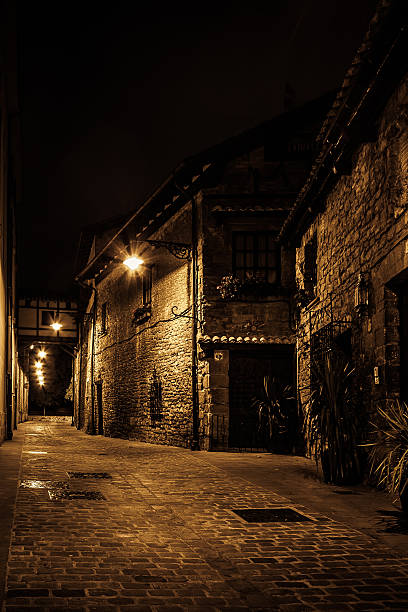 istock dark street in the night 465049493