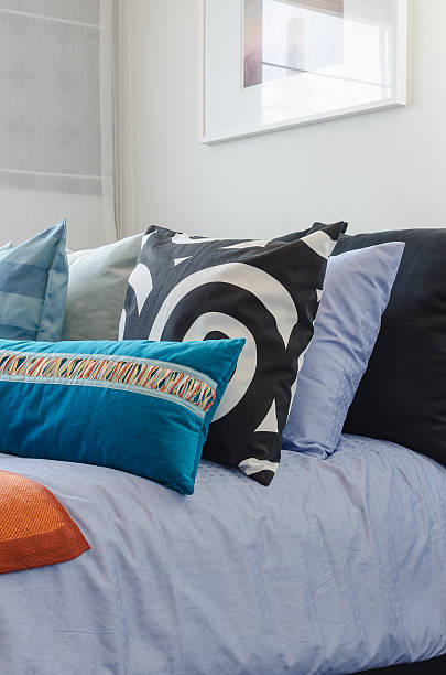 istock colorful pillows on bed in modern bedroom 465049796