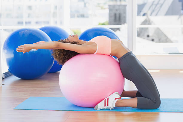 istock Side view of a fit woman exercising 465050902