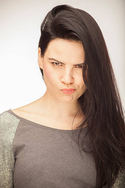 Ragazza mostrando le emozioni con le espressioni del viso - foto stock