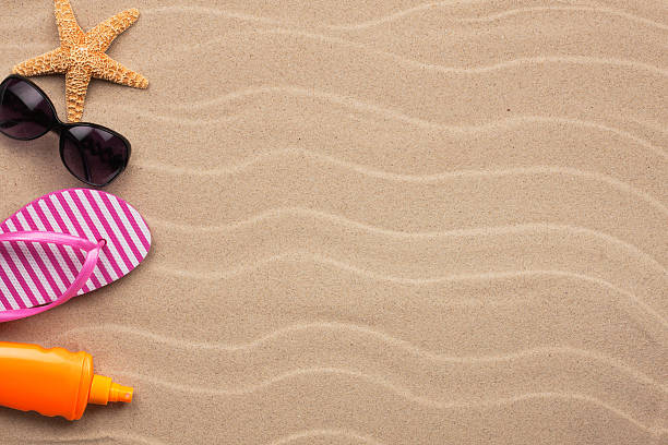 istock Accessories for the beach lying on the sand 465053396