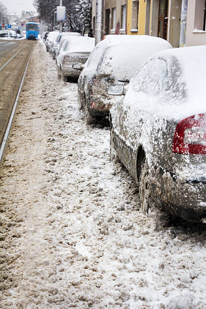 istock Parked Cars covered with snow 465054286