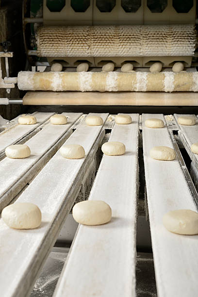 istock A production line on a conveyor belt in a bakery 465055834
