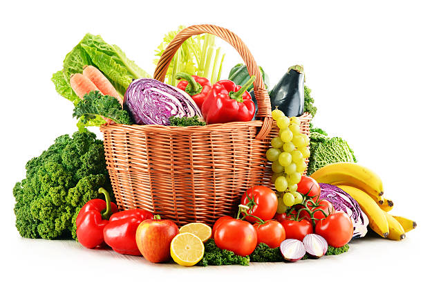 istock Wicker basket with assorted organic vegetables and fruits  isola 465056461