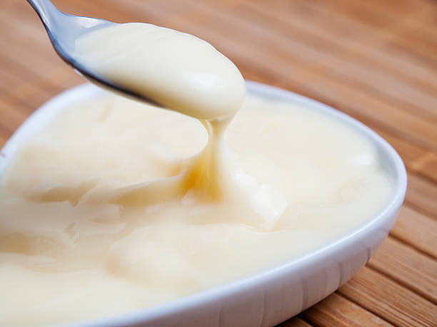 istock Spoonful of custard detail 465058047