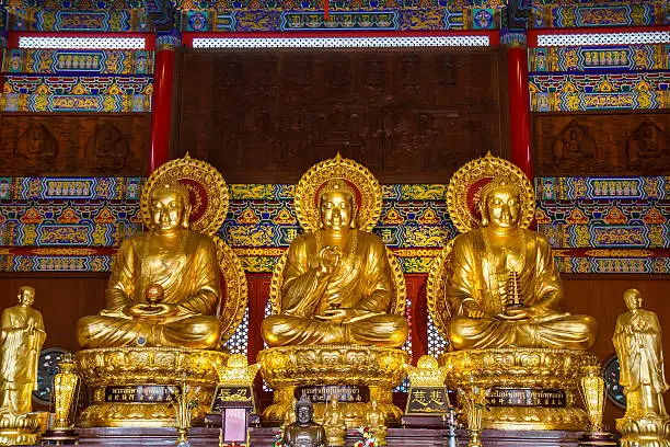 Buddha statues Wat Borom Racha Kanchana Phisake (Wat Leng Noei Yi 2) in Thailand. It is the most famous and largest Chinese Buddhist temple in Thailand.
