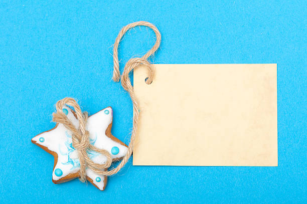 istock Christmas gingerbread cake star icing decoration and blank card 465060343