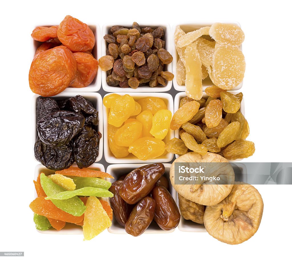 Bowls of various dried fruits Bowls of various dried fruits top view Abundance Stock Photo