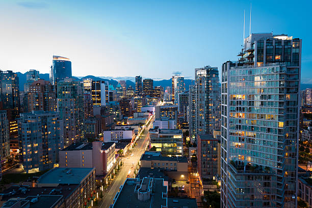 Downtown Vancouver at dusk Downtown Vancouver at dusk vancouver canada stock pictures, royalty-free photos & images