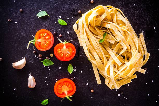 istock fresh organic cherry tomatoes and fettuccini with basil and garlic 465061196