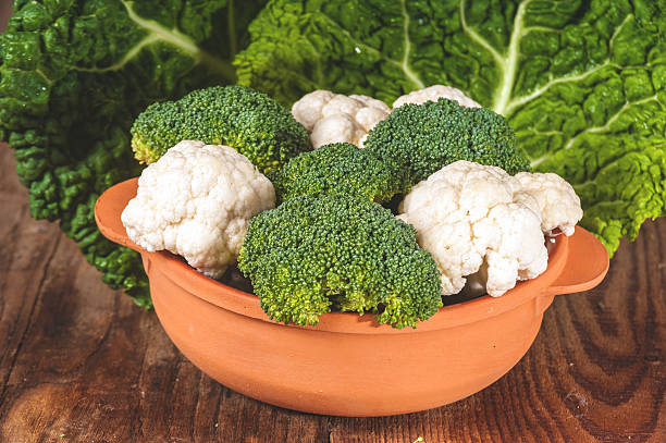 istock Delicious broccoli and cauliflower has a wooden rustic table 465061718