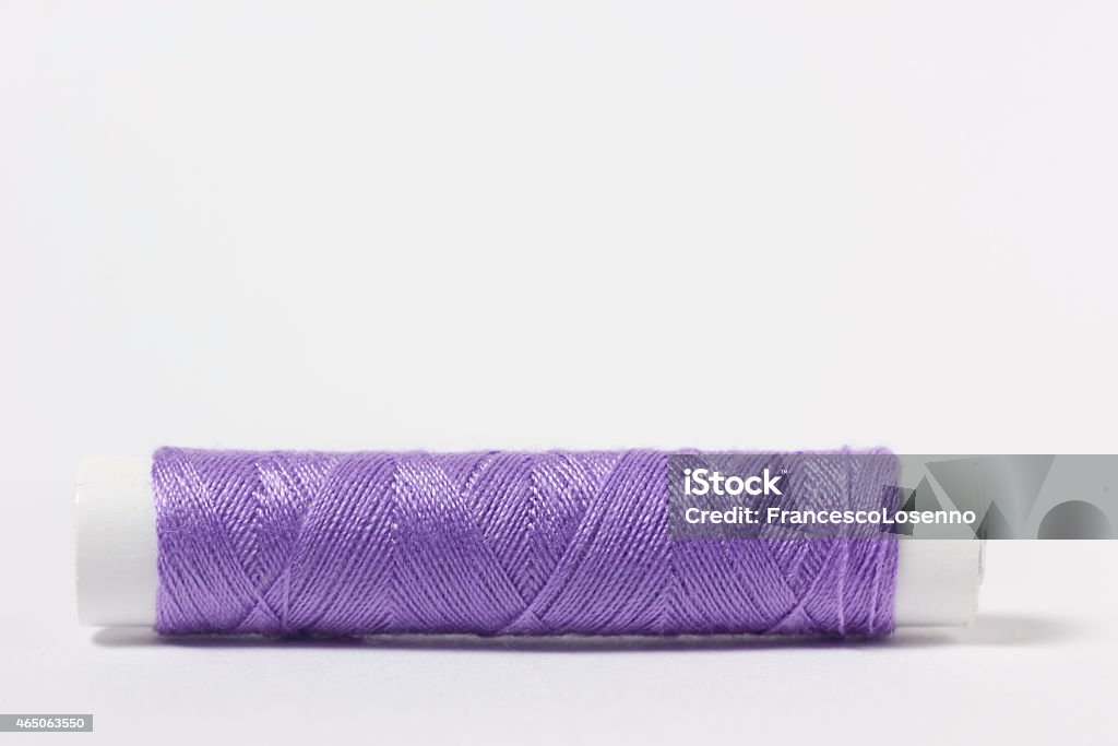 Cotton thread purple Cotton fabric purple on white background 2015 Stock Photo