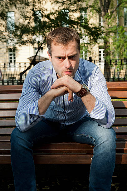 istock Man relaxing in the public garden 465066799