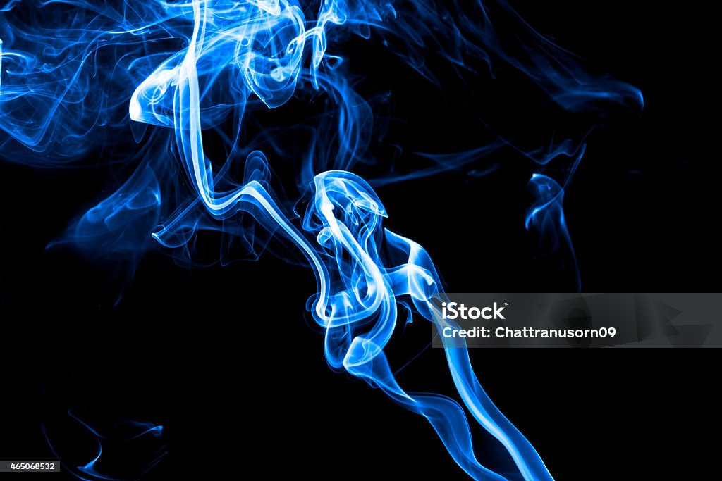 Blue smoke isolated on back background Blue smoke isolated with light on back background 2015 Stock Photo