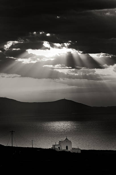 istock View of Greek Church Beneath Clouds 465068804