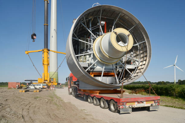 Semi-Truck transporting Gear Equipment of a Wind Turbine stock photo