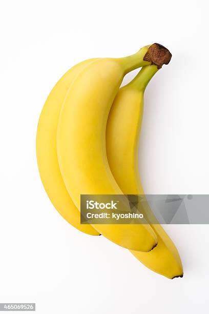Isolated Shot Of Bunch Of Bananas On White Background Stock Photo - Download Image Now