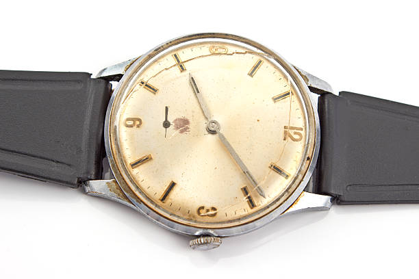 istock Closeup of old broken wristwatch isolated on white 465069711