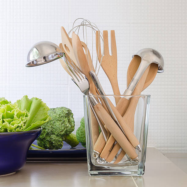 istock utensils in glass bottle on kitchen's counter 465070324