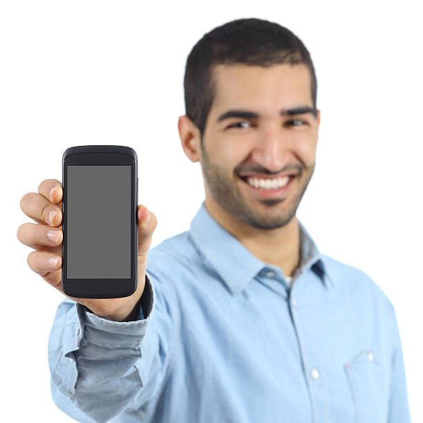 istock Arab casual man showing a mobile phone application 465070453