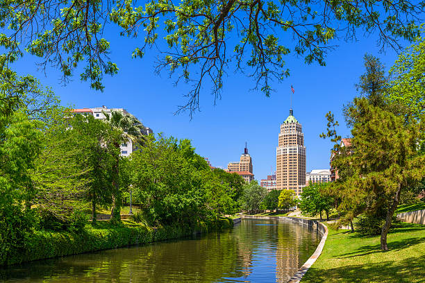 istock Riverwalk San Antonio Texas skyline, park walkway, scenic river canal 465071012