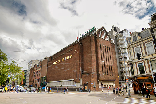 Amsterdam, Netherlands - July 13, 2012: The Heineken Experience, located in Amsterdam, is a historic brewery and corporate visitor center for internationally distributed Dutch pilsner, Heineken beer.